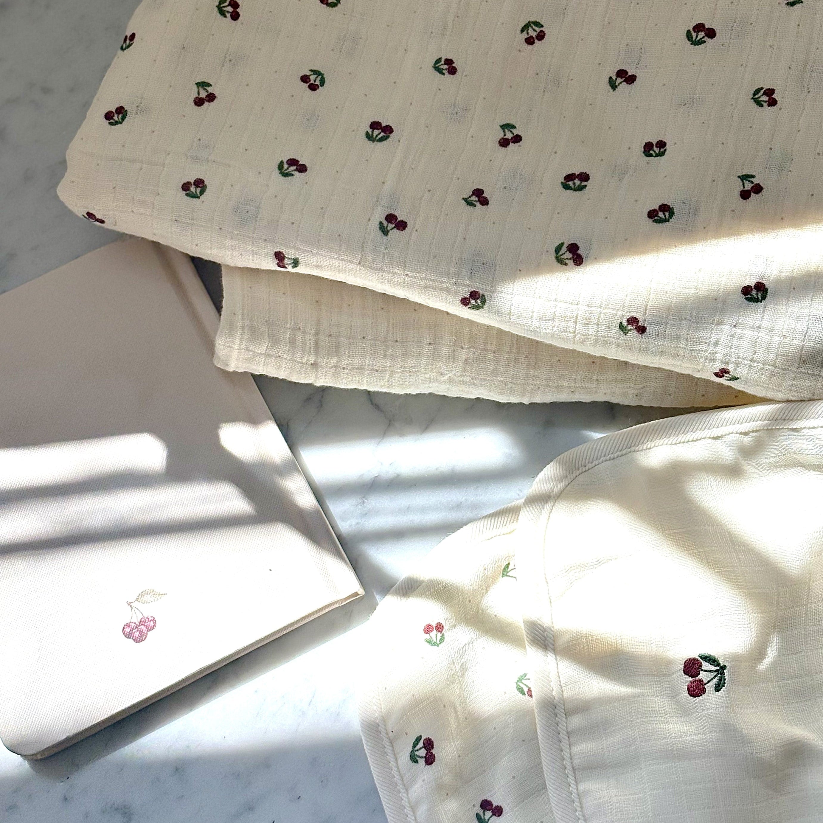 pastel cherry print baby layette
