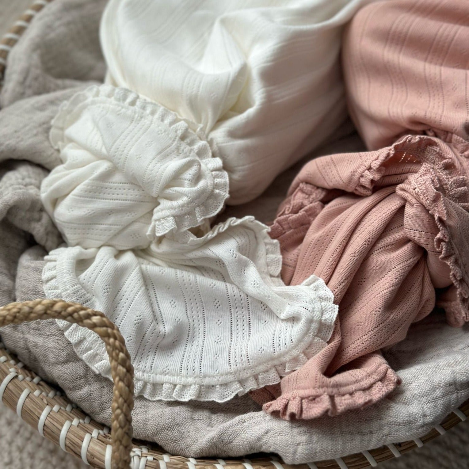 pink white swaddle