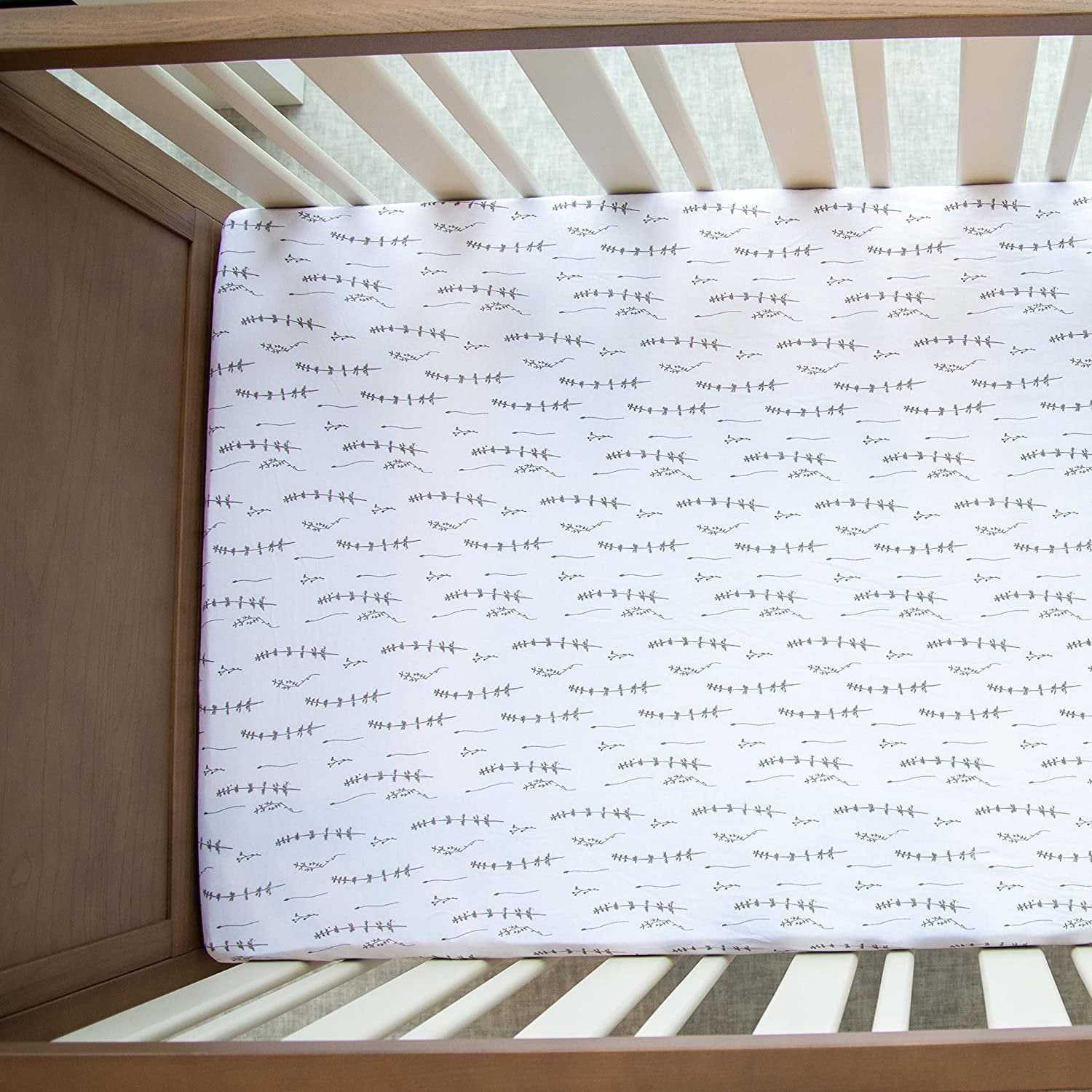 Fitted and plush crib sheet set forest grey leaf print