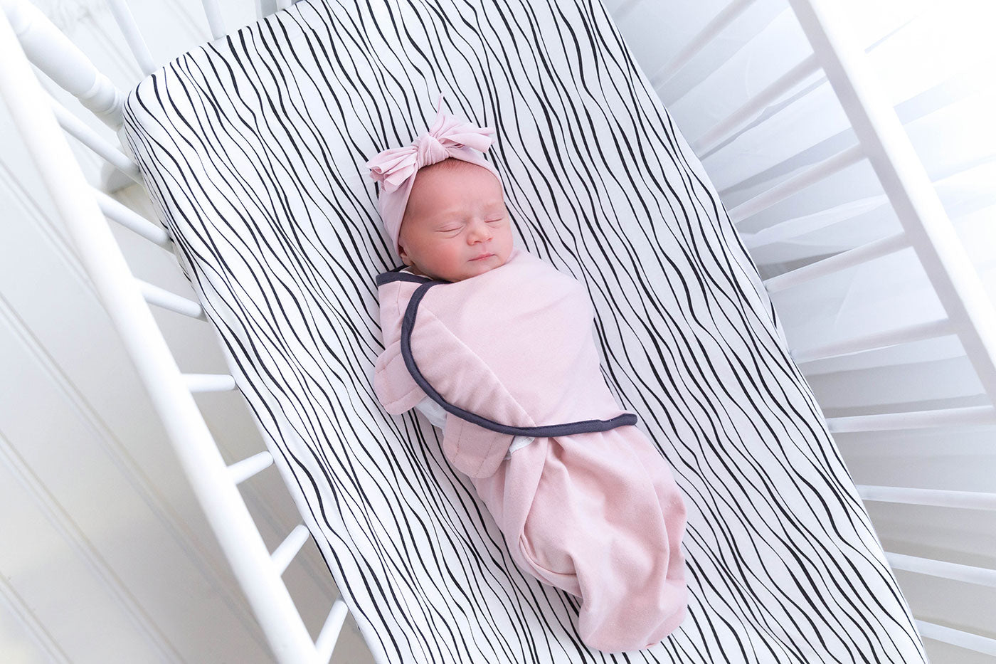 Blush Adjustable Swaddle