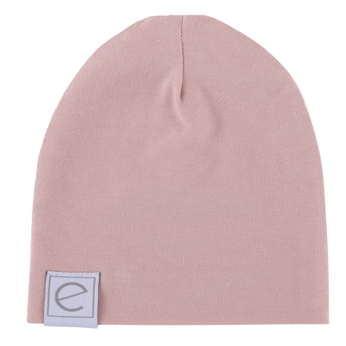 Pink beanie with a logo tag on a white background