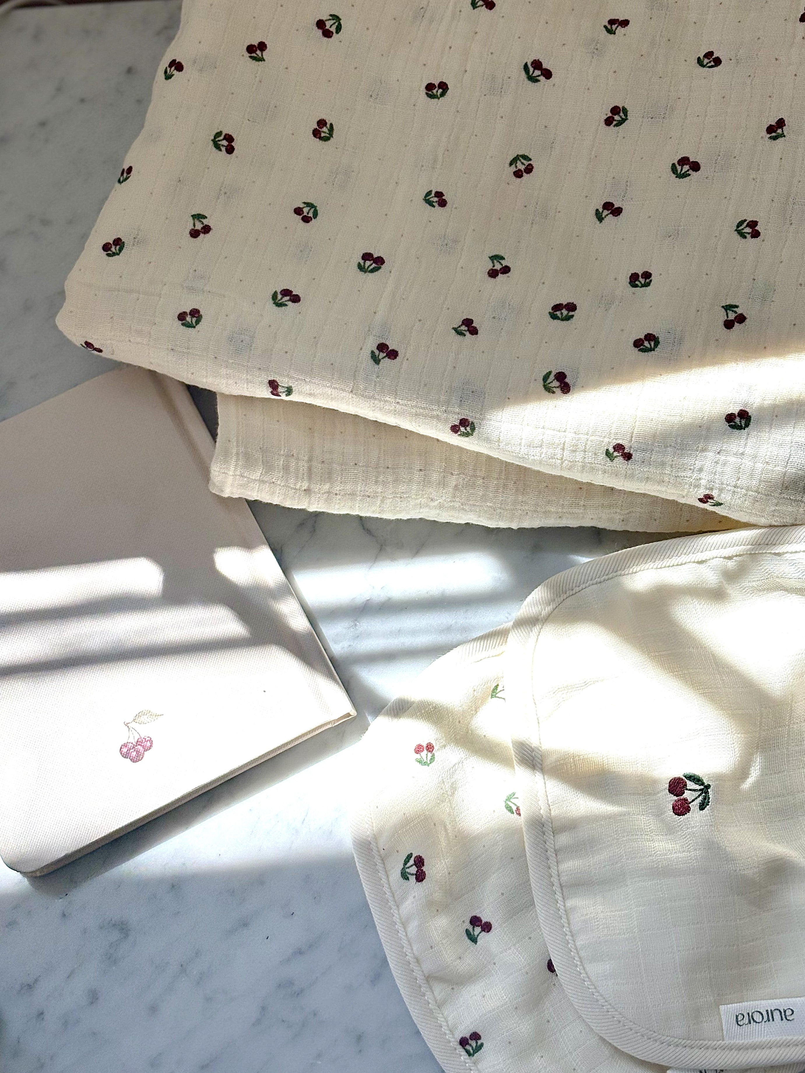 pastel cherry print baby layette