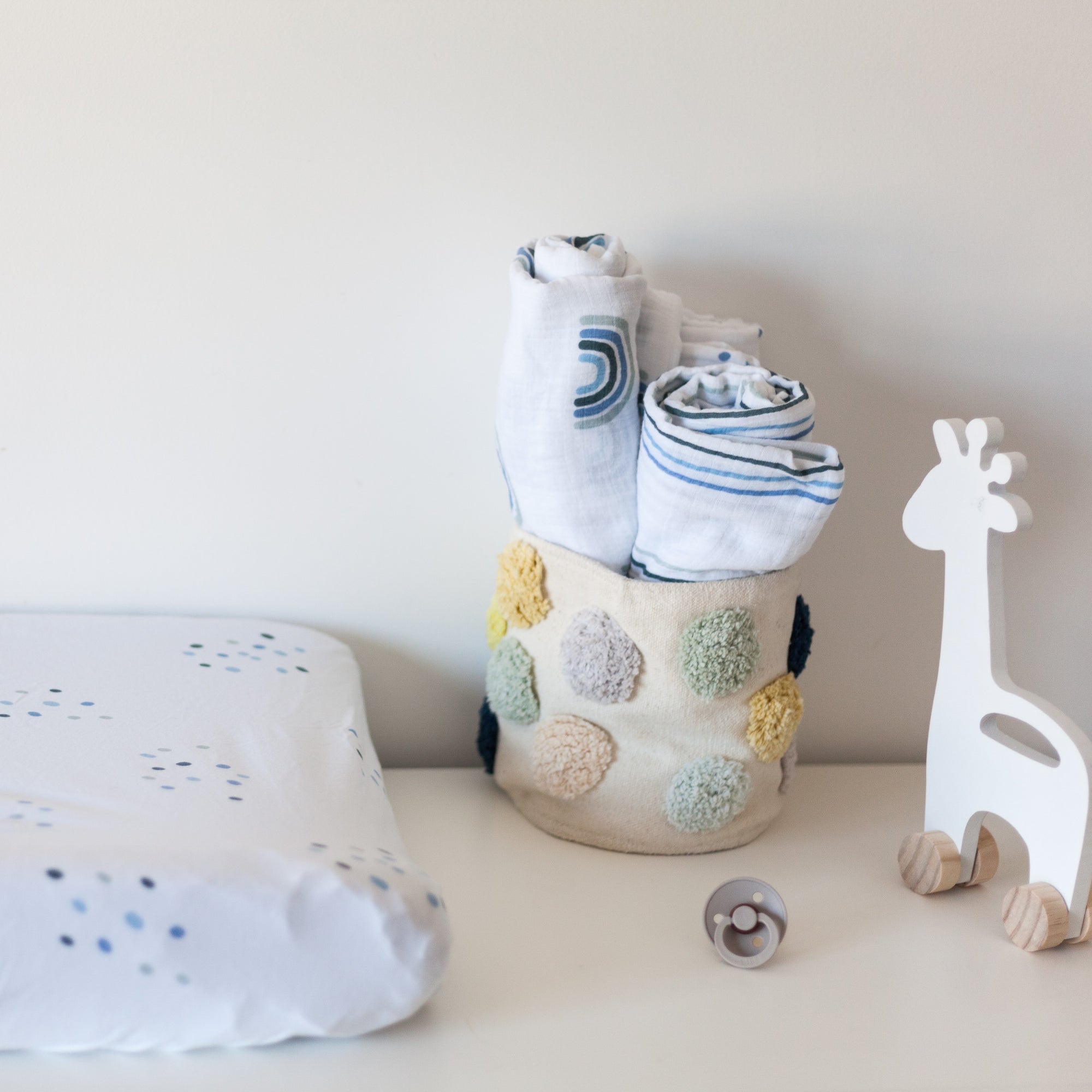 Dusty blue rainbow lightweight baby swaddle