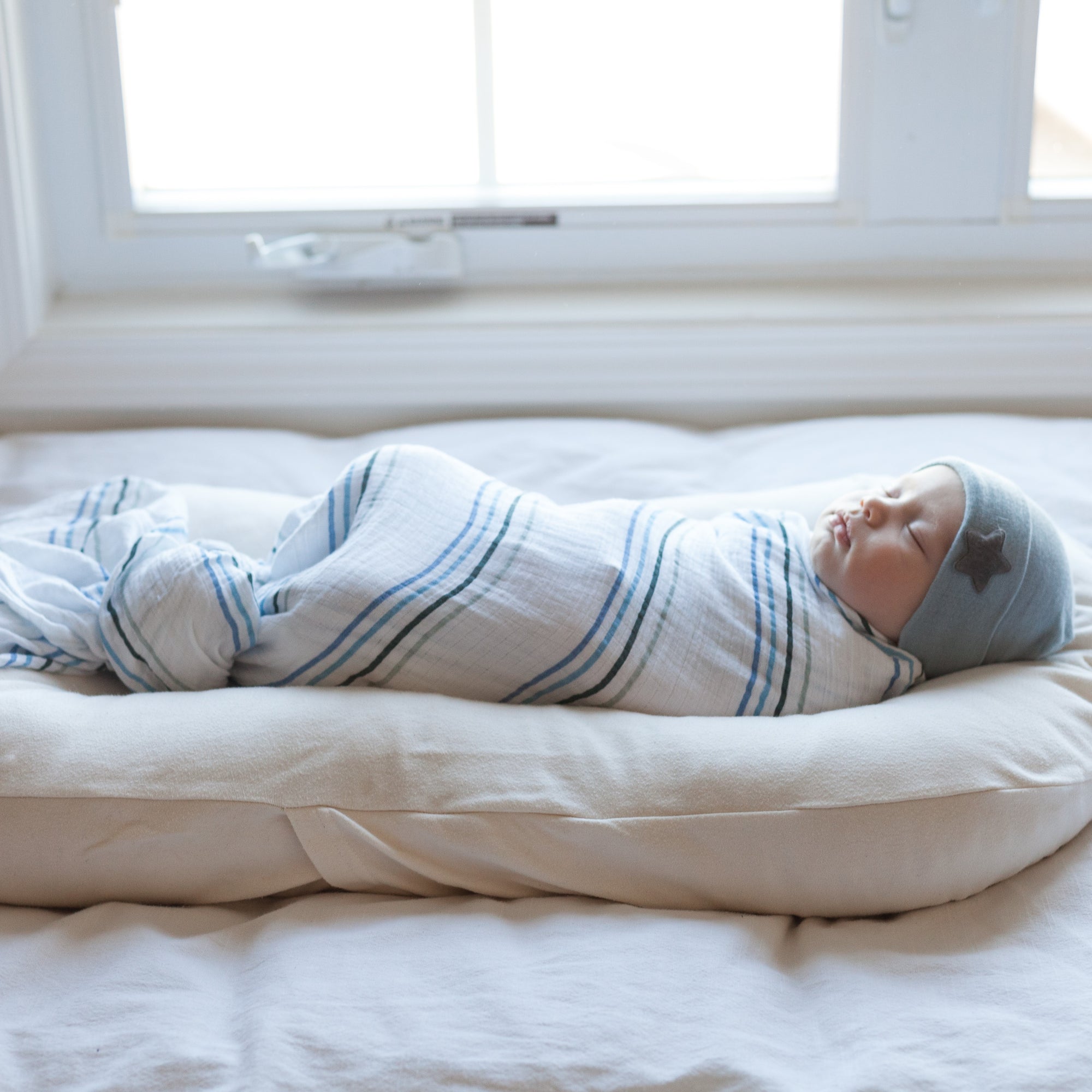 Dusty blue rainbow ready-to-gift baby swaddle