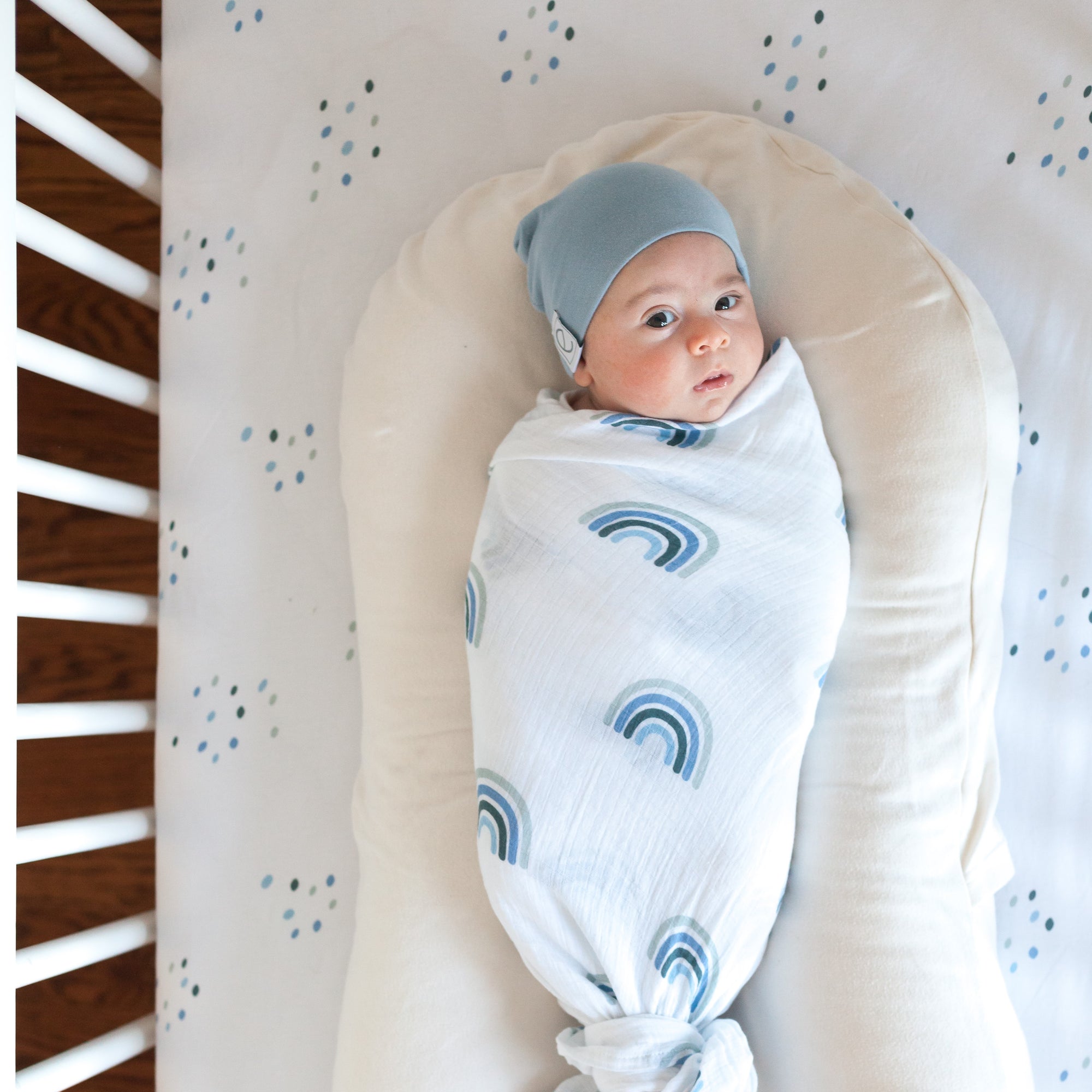 dusty blue rainbow soft cotton swaddle