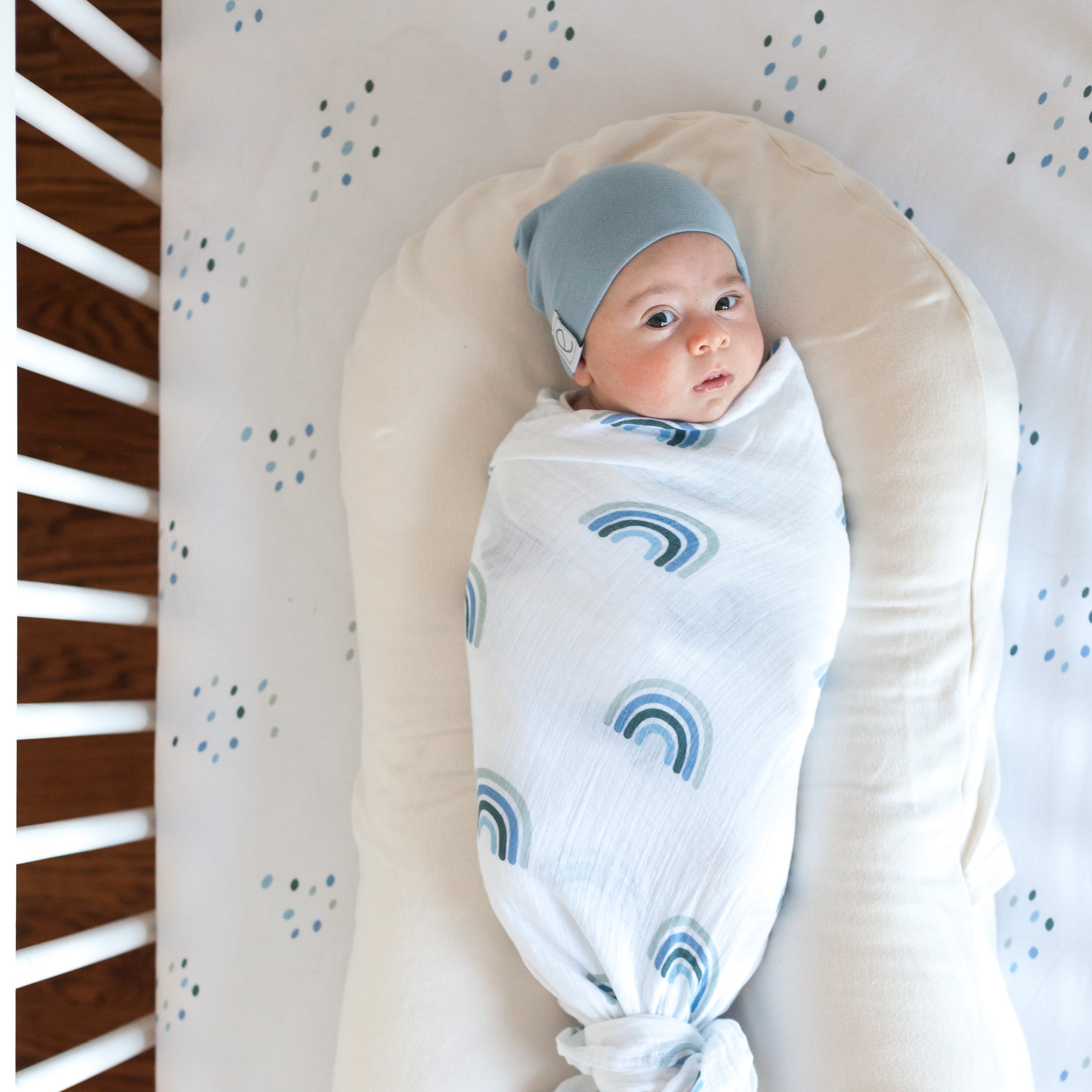 dusty blue rainbow soft cotton swaddle